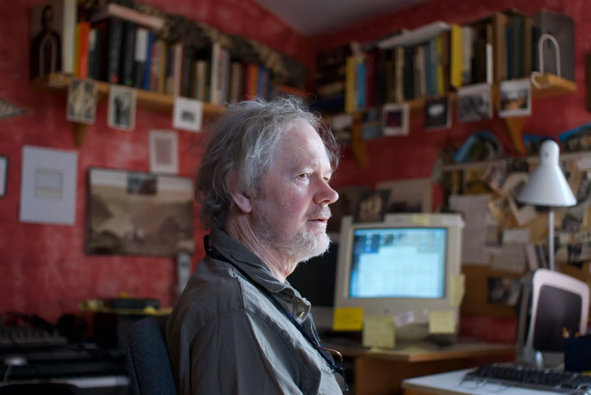 man sitting in front of computer