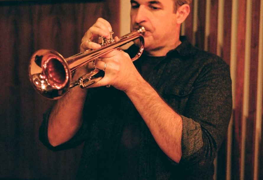 Kris Tiner playing trumpet