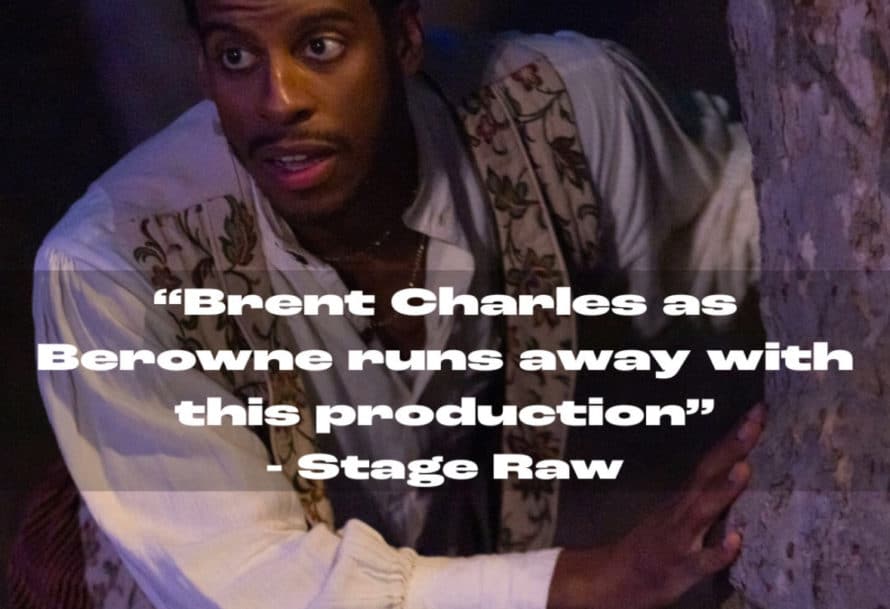 A man in a Shakespeare-era costumes peeks behind a tree.